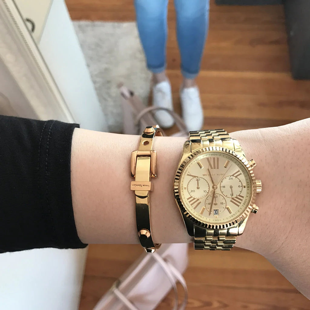  Michael Kors Lexington MK5556 women's gold-tone stainless steel chronograph watch. 