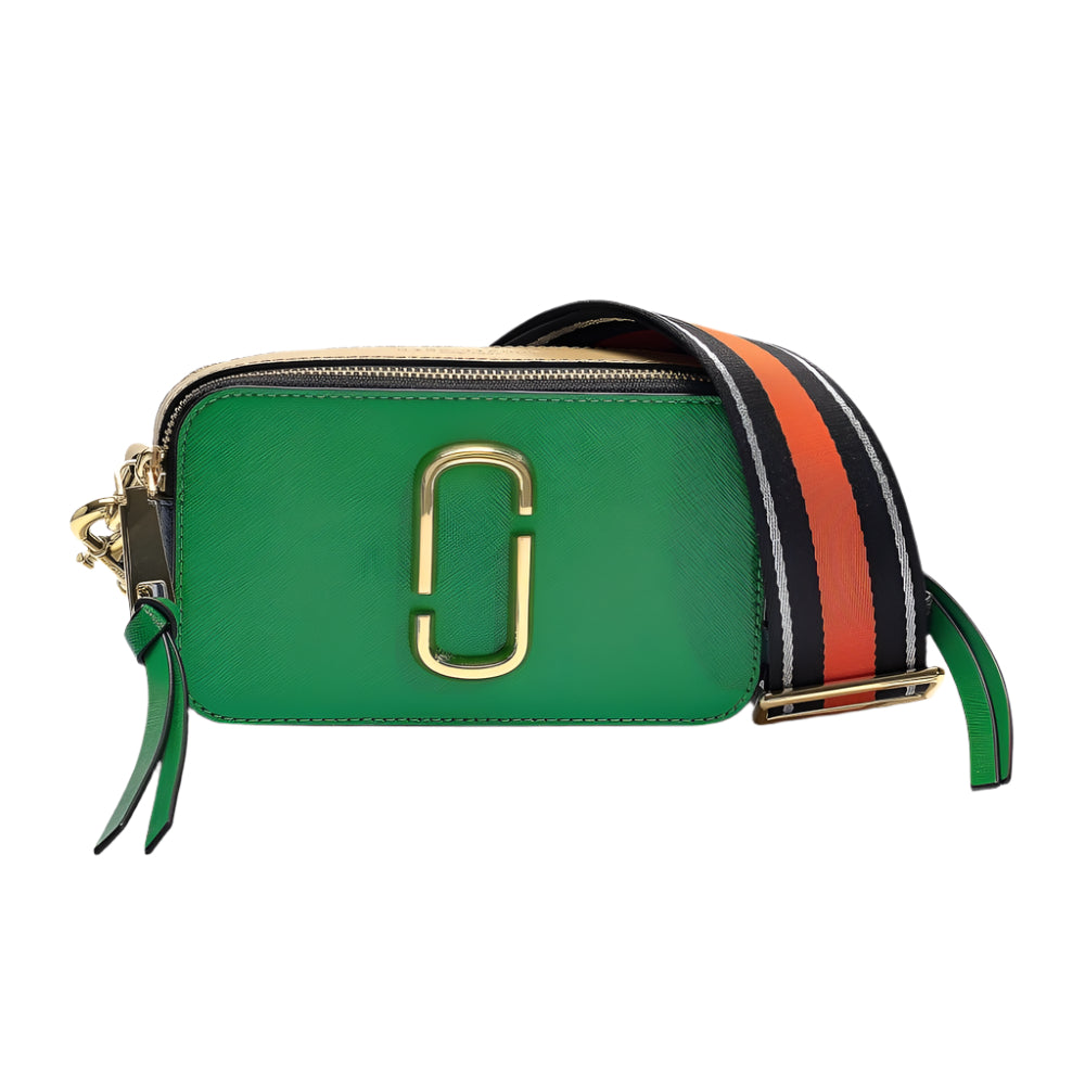 Green handbag with a striped strap on a light gray background